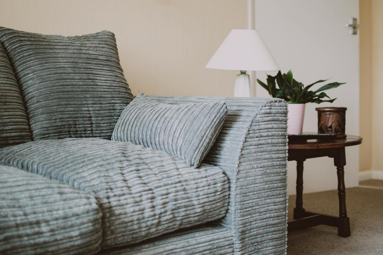 empty sofa near side table